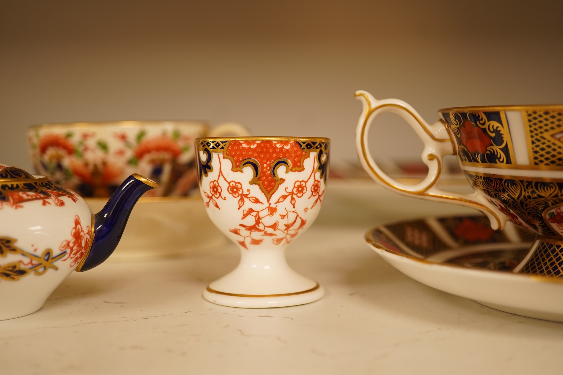 Twelve items of various patterns of Royal Crown Derby, largest item 27cm diameter